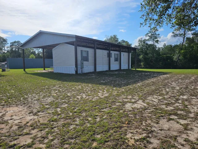 Back and side view of home from the SE 196th Terr gate.