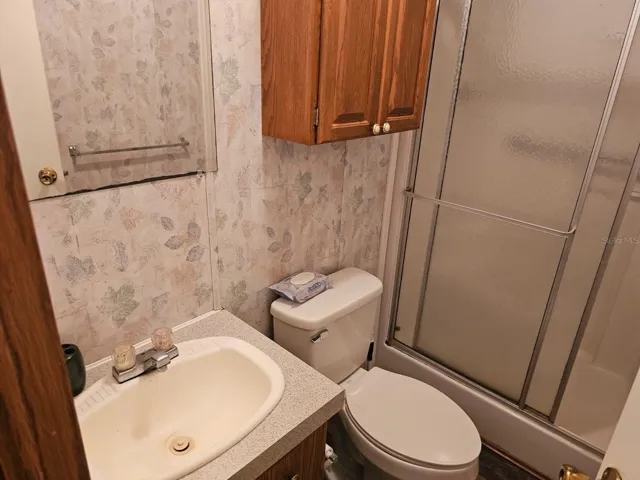 Bathroom with step in shower