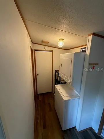 Indoor Laundry room across from bathroom