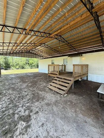 Front entrance with nice wooden deck