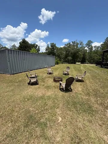 Chairs and firepit area ready for for making smores and memories