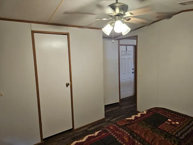 Front bedroom with walk in closet. Off of the living room
