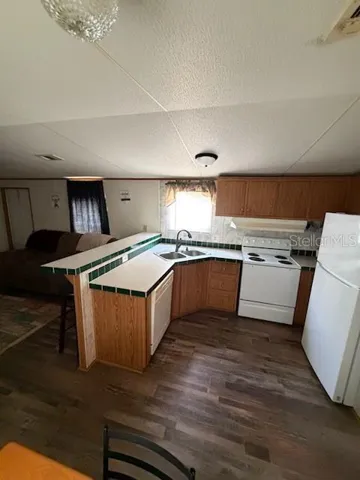 Kitchen area with all appliances.