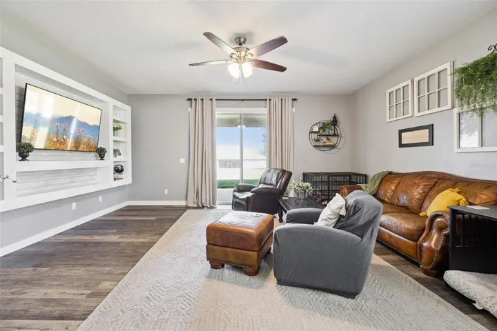 Open living space connects naturally to the kitchen and dining areas for easy everyday flow.