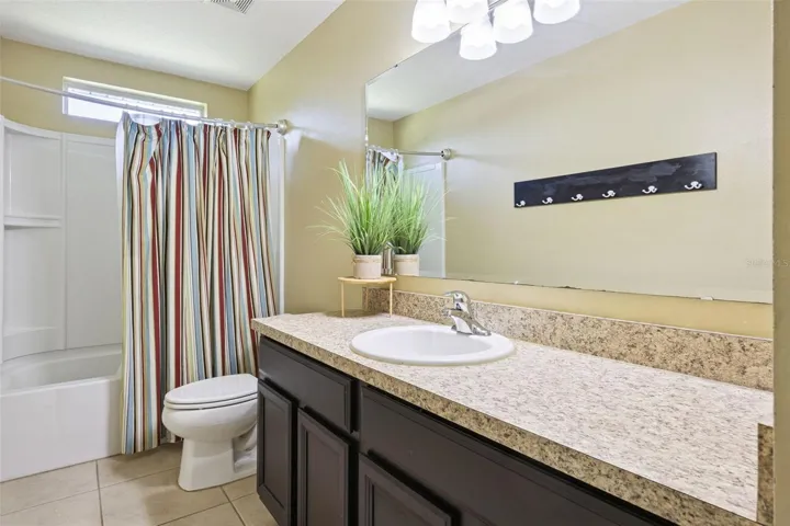 A third full bath improves flow and makes busy households much easier to manage.