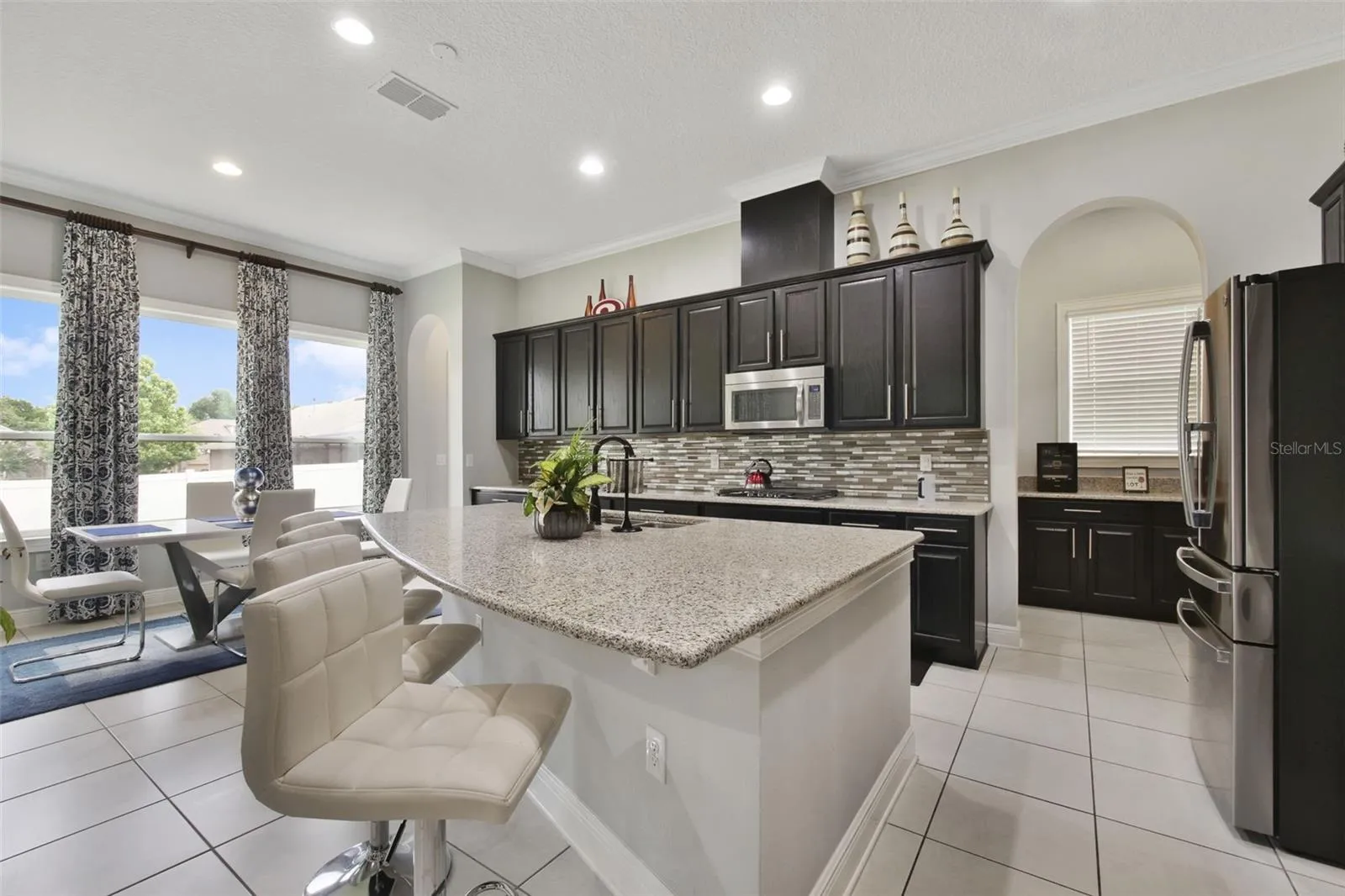 Kitchen with island and breakfast dining area