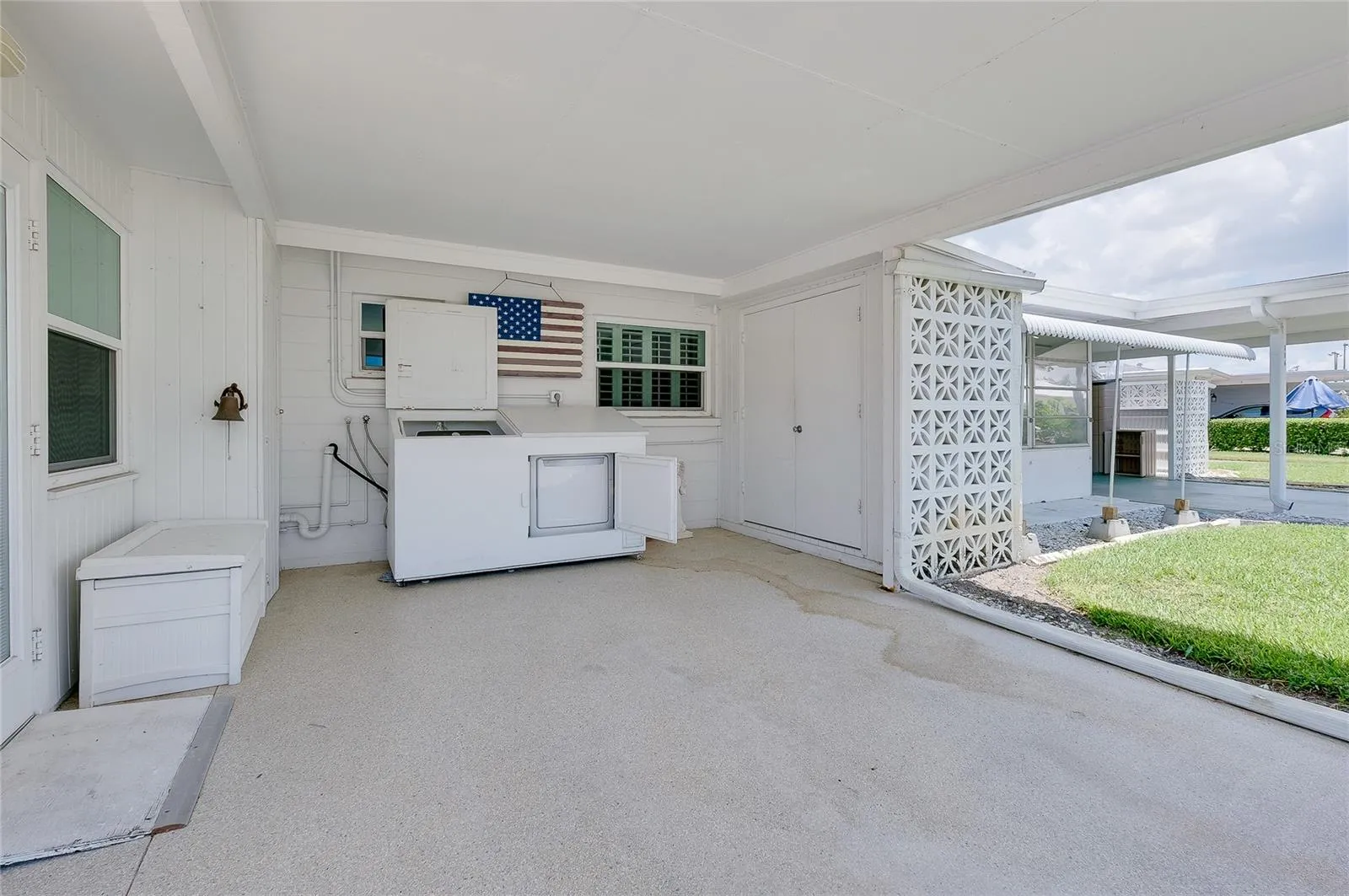 Washer & dryer located in carport
