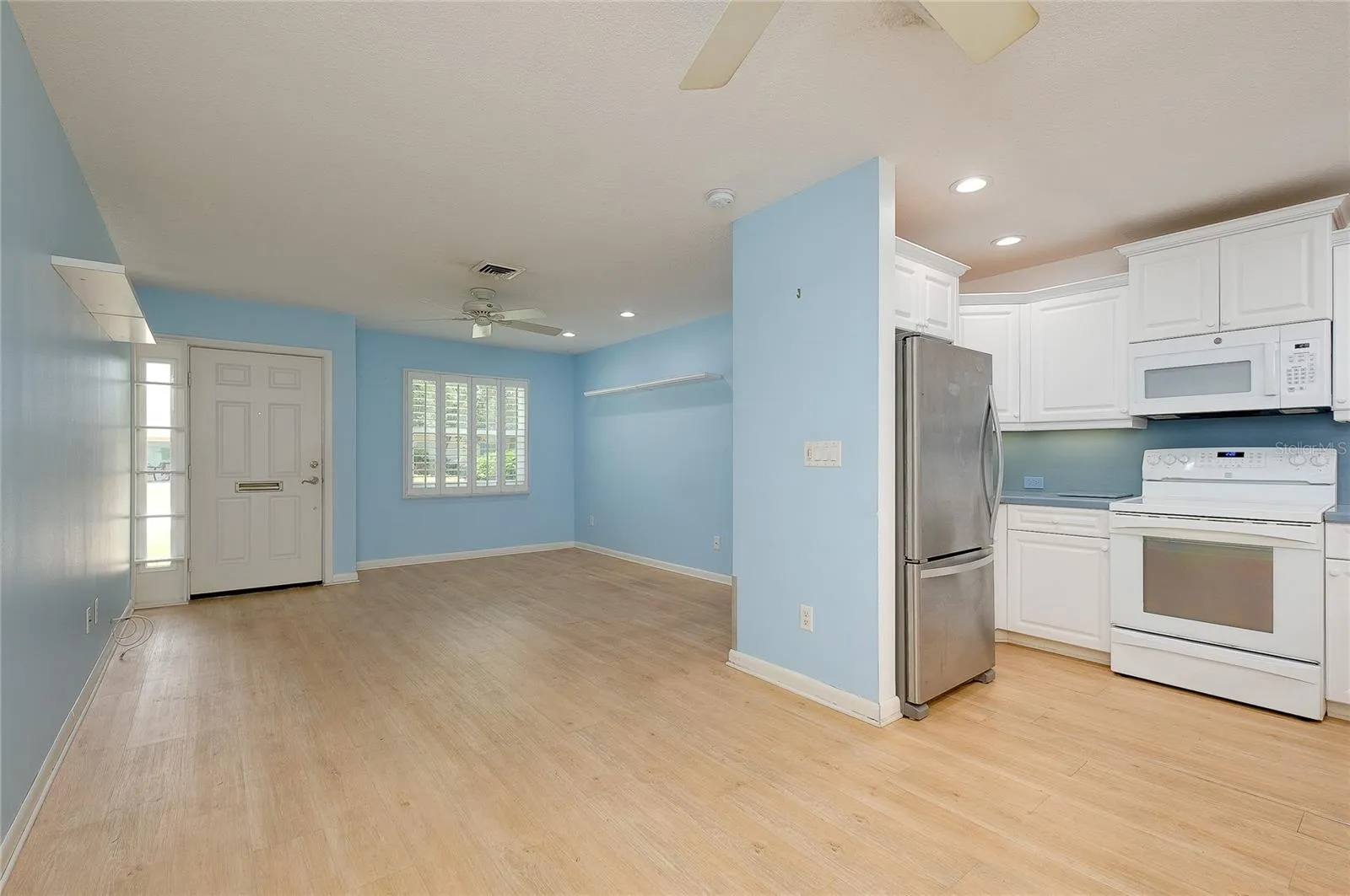 From from dining area into kitchen and living room