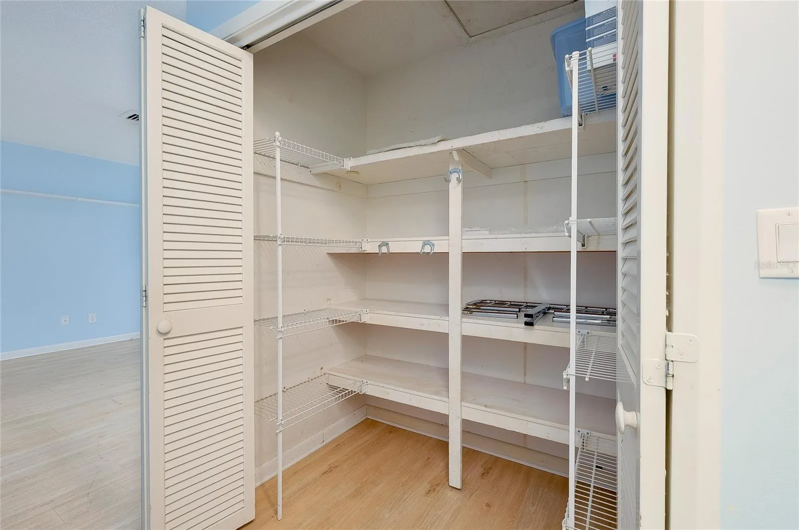 Hall closet has plenty of storage