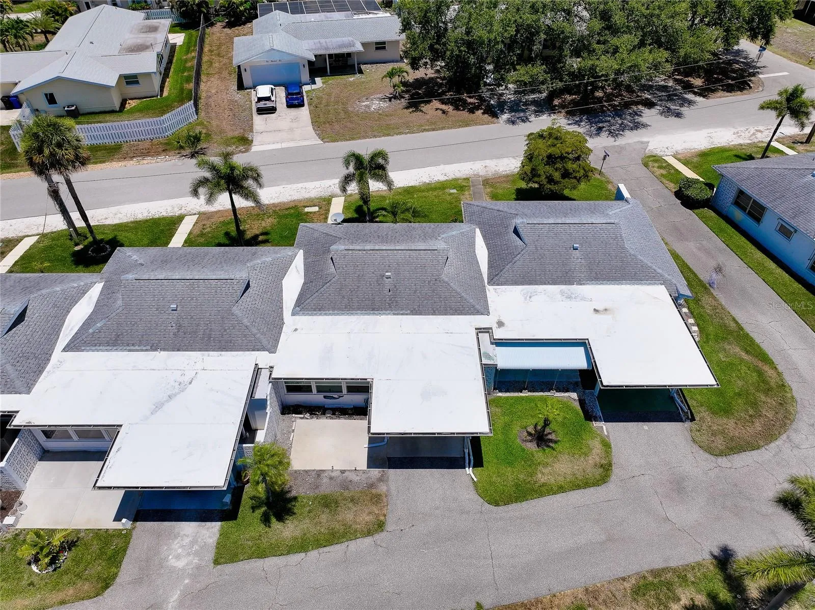 Aerial view of rear of the unit showing carport area.