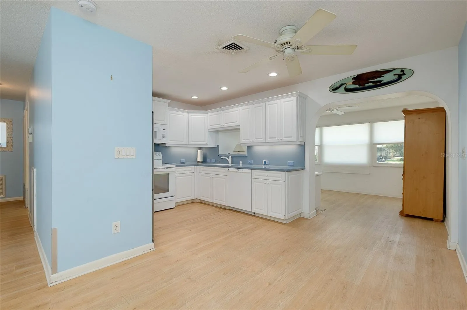 Kitchen with access to enclosed Florida room