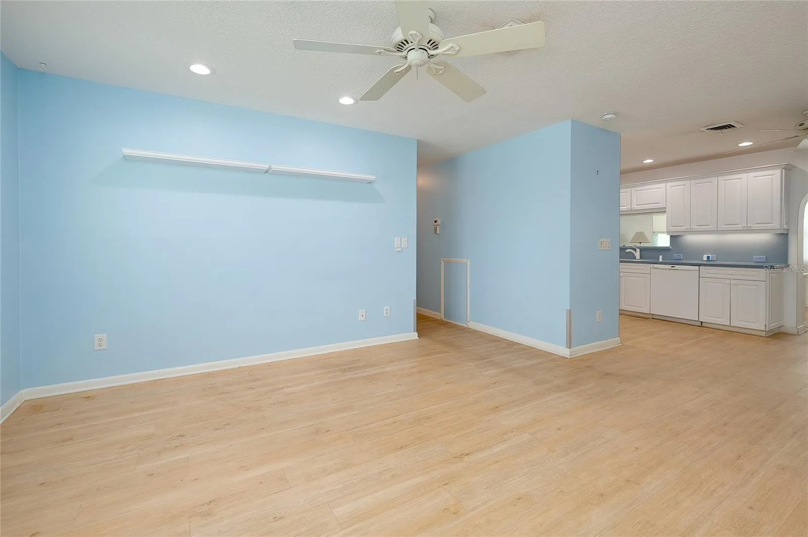 Living room access to hall to bedrooms and bath