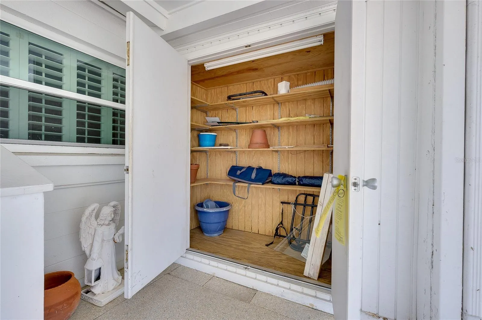 Carport storage area.