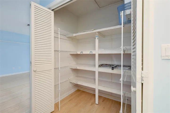 Hall closet has plenty of storage