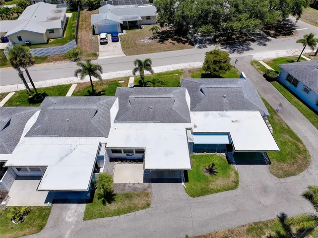 Aerial view of rear of the unit showing carport area.