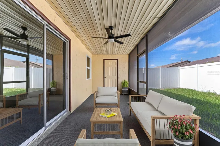 VIRTUALLY STAGED - Rear Covered Screened Porch