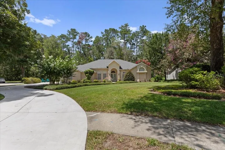 Side walk and extended driveway with parking pad