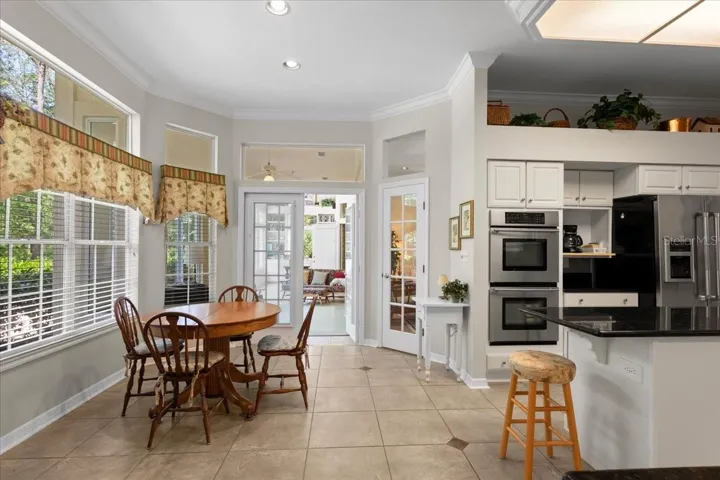 View of Kitchen and Breakfast Nook leading to Florida Room