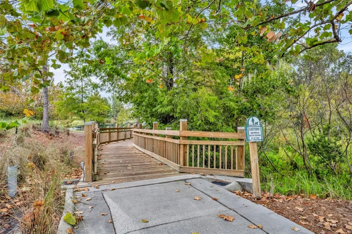 Walking Trail along pond to Downtown Celebration