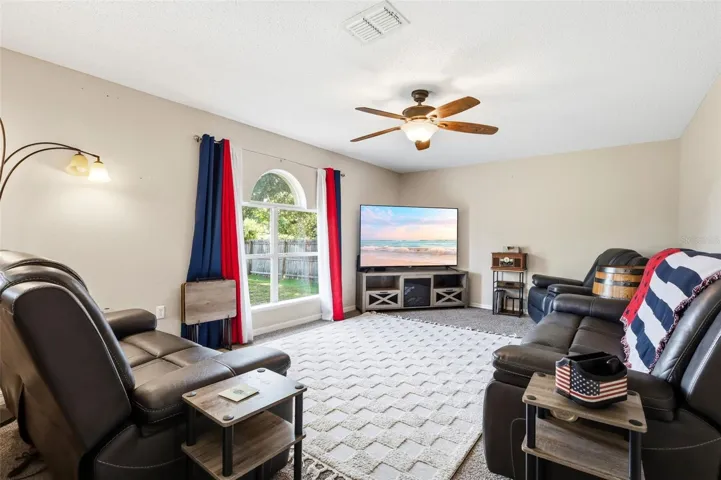 Large living room! View to private back yard!