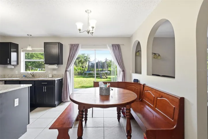 Penty of dining space and sliding door to back patio over looking horse pasture