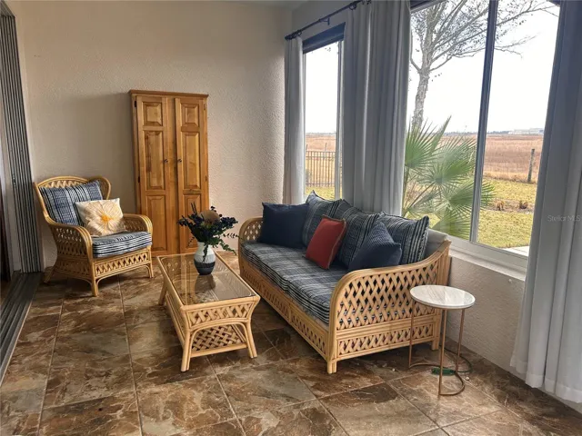 Enclosed lanai with queen size pull out bed.