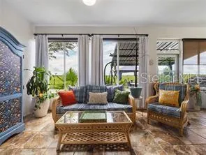 Enclosed lanai with a pull out queen sofa.