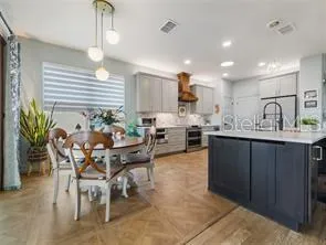 Kitchen dining nook. The table will be different. The current glass top table is shown in other photos.