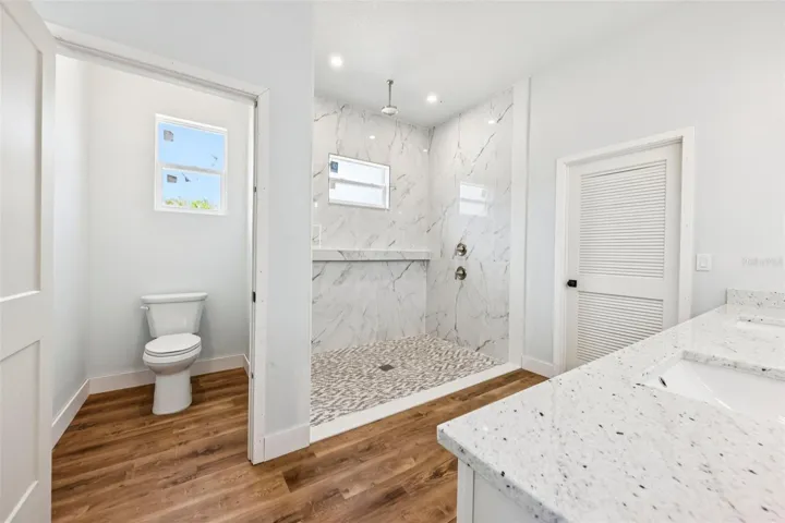 Toilet Closet and massive 2 shower head shower