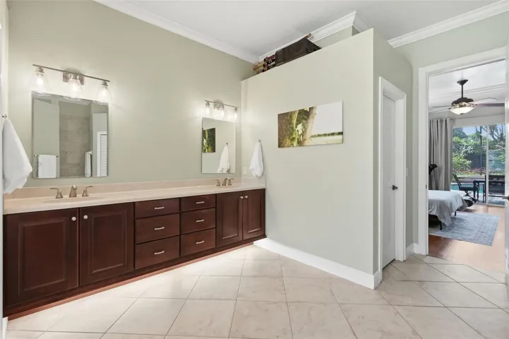 Primary bathroom with dual closets