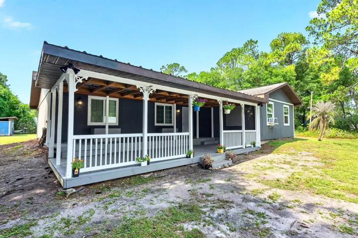 Welcome to Canaveral Groves, where you can enjoy the space, freedom, and flexibility that only a 1.02 ACRE property with NO HOA can offer!