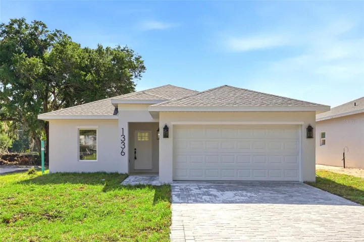 Brand new construction home in Leesburg, FL with fresh finishes and move-in-ready curb appeal.