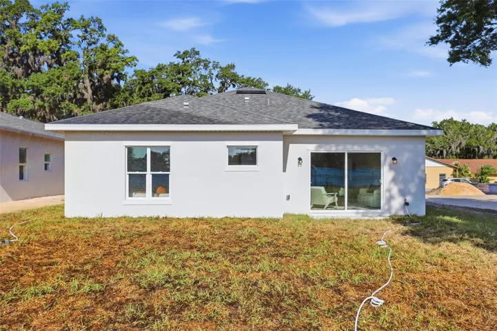 Backyard with usable outdoor space and no rear residential neighbor, backing up to Beverly Shores Elementary.