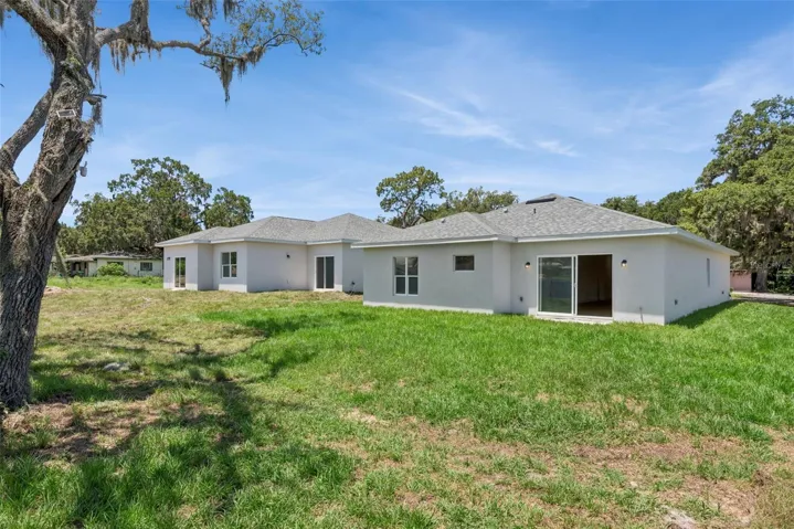 Spacious backyard setting with room for pets, play, outdoor seating, or future landscaping ideas.