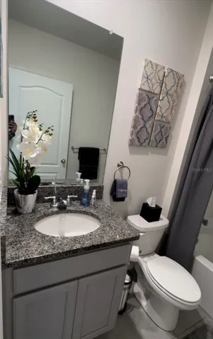 Bathroom 2. Image virtually stage