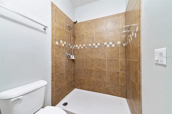 The Primary tiled shower