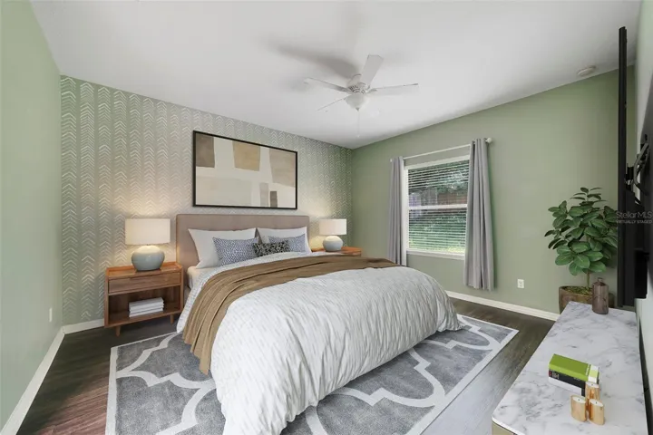 The spacious Primary Suite serves as a relaxing retreat with a walk-in closet and a private EN SUITE BATH. Virtually Staged