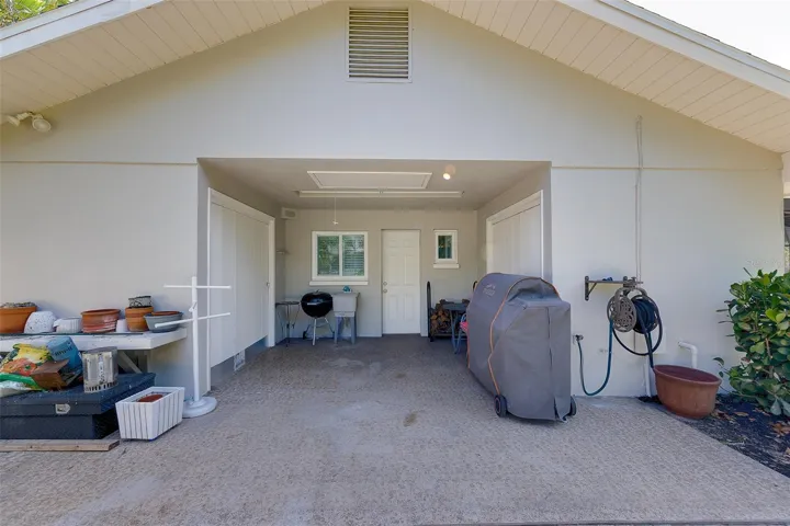 Entrance to the 2nd guest bedroom and private patio - can be used as in law suite. Extra storage for the yard with the 2 side closets
