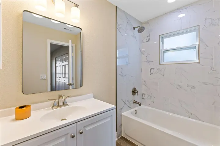 NEW Bathrooms with Ceiling high Tile Wainscot