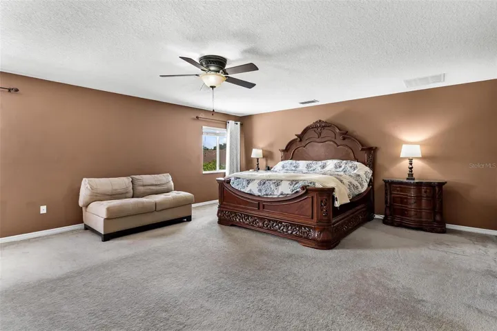 Oversized Primary Suite is a perfect place to relax after a day or evening entertaining.