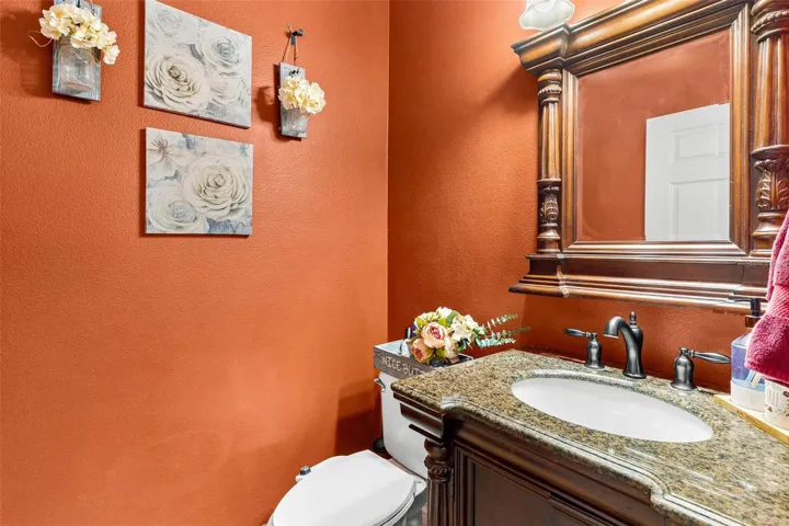 1/2 bathroom located downstairs.