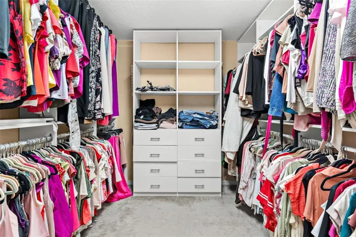 Primary Bedroom Walk in closet.