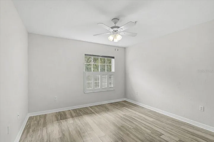 Giest bedroom with plantation shutters