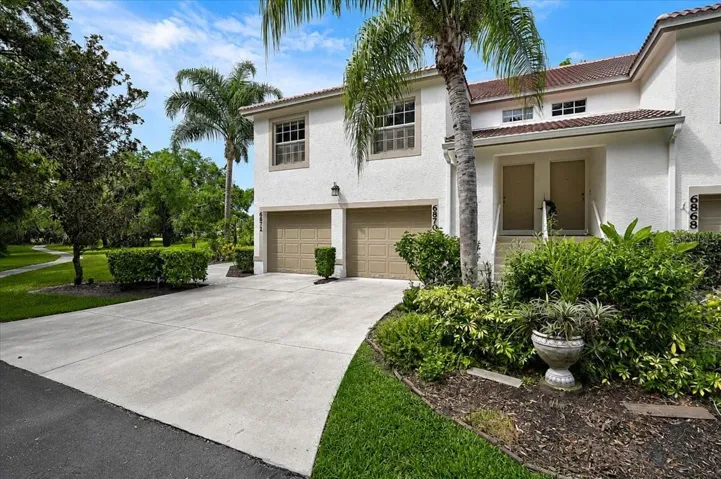 The one car garage has additional storage space and an indoor stairwell to the living area