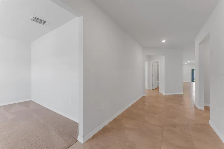 office as you come in (on left)