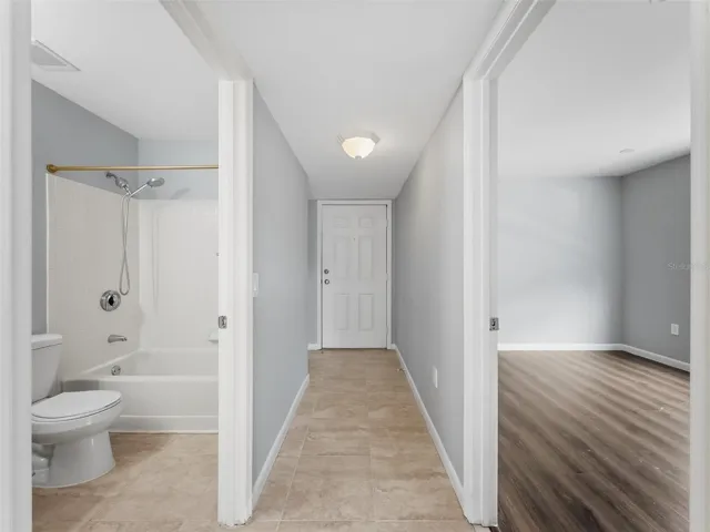 View of Hall from Bedroom 2 - 9481 Highland Oak Drive #1502, Tampa, FL 33647