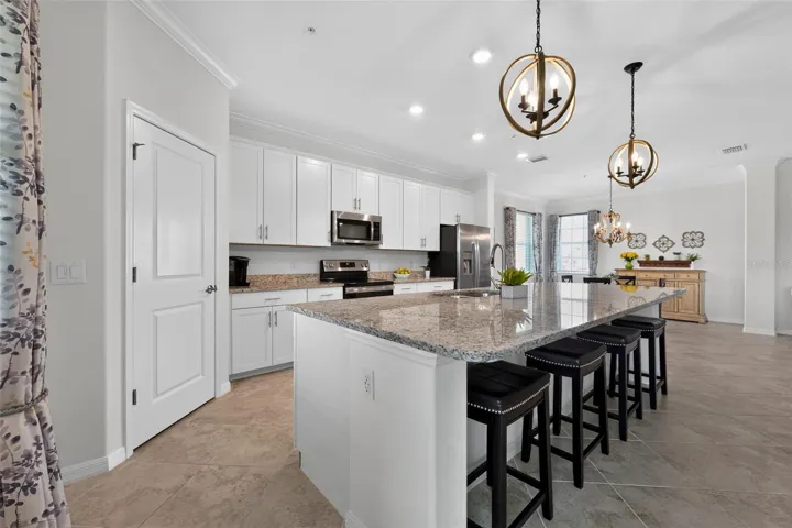 Gourmet kitchen with large island in a spacious open layout