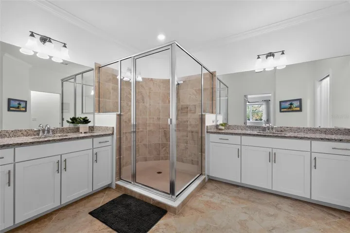 Large shower with two separate vanities