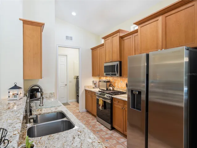 Granite countertops with new sink & faucet.