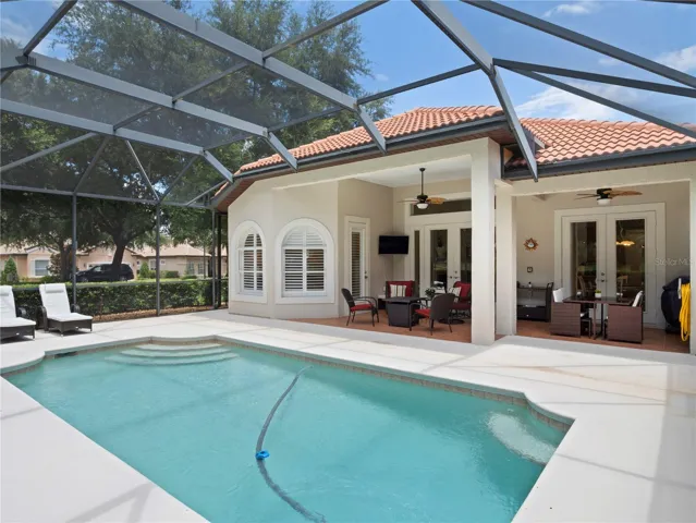 Spacious pool and entertainment space.